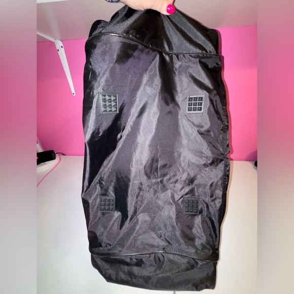 Black Duffel Bag with White Accents and Modern Design - Picture 5 of 13